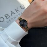 اباکو V256SXGBMG گالری تصویر 1 با بدنه استیل طلایی، صفحه مشکی و قاب دایره‌ای