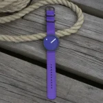 پیکتو PR44030-R027 ساعت مچی اسپرت با صفحه بنفش، قاب رزین سرمه‌ای و بند پارچه‌ای بنفش