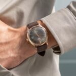 Orient RA-AC0P04Y4 ساعت مچی مردانه با صفحه سبز و بند قهوه‌ای