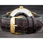 اورینت TAC08002F3 - ساعت مچی مردانه کلاسیک با صفحه سبز و قاب استیل طلایی