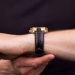 اورینت RA-AK0309 مدل RA-AK0309-02 با طراحی صفحه قهوه‌ای و بند چرم