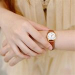 Casio LTP-1094Q-7B8RDF زنانه با صفحه سفید و قاب طلایی، شیشه کریستال معدنی – گالری تصویر 3