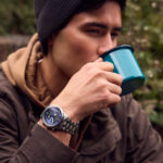 CITIZEN JV2000-51L4 ساعت مچی با قاب استیل گرد و شیشه کریستال ضدانعکاسی